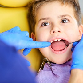 young boy in dental chair