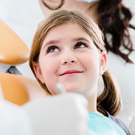 Young girl in dental chair