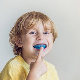 little boy wearing a children’s athletic mouthguard in Midland