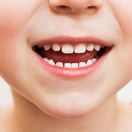 Closeup of child's healthy smile