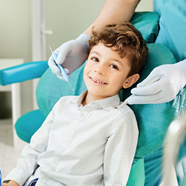 a child preparing for sedation dentistry before undergoing a procedure