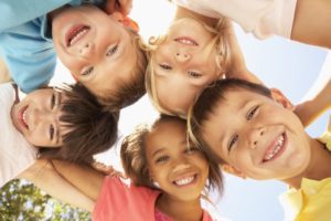 a group of children with healthy smiles