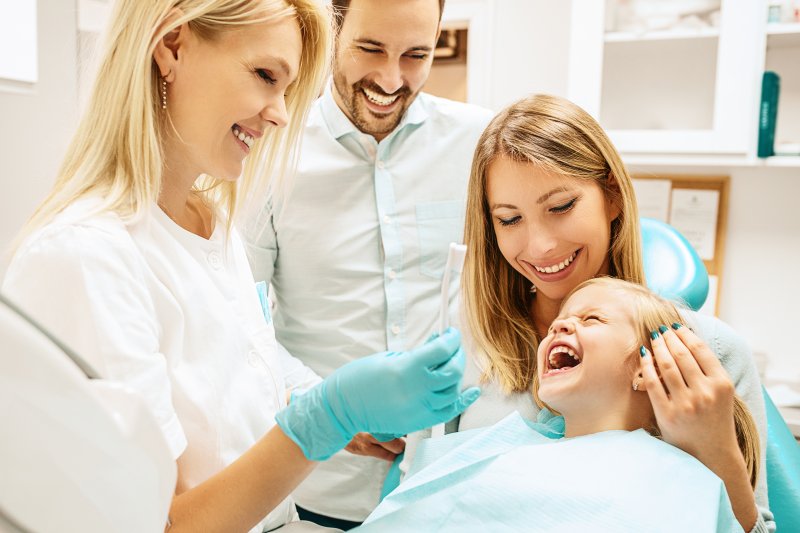 Family with pediatric dentist in Midland