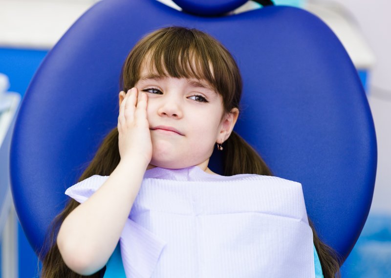 Child at dentist for tooth extraction