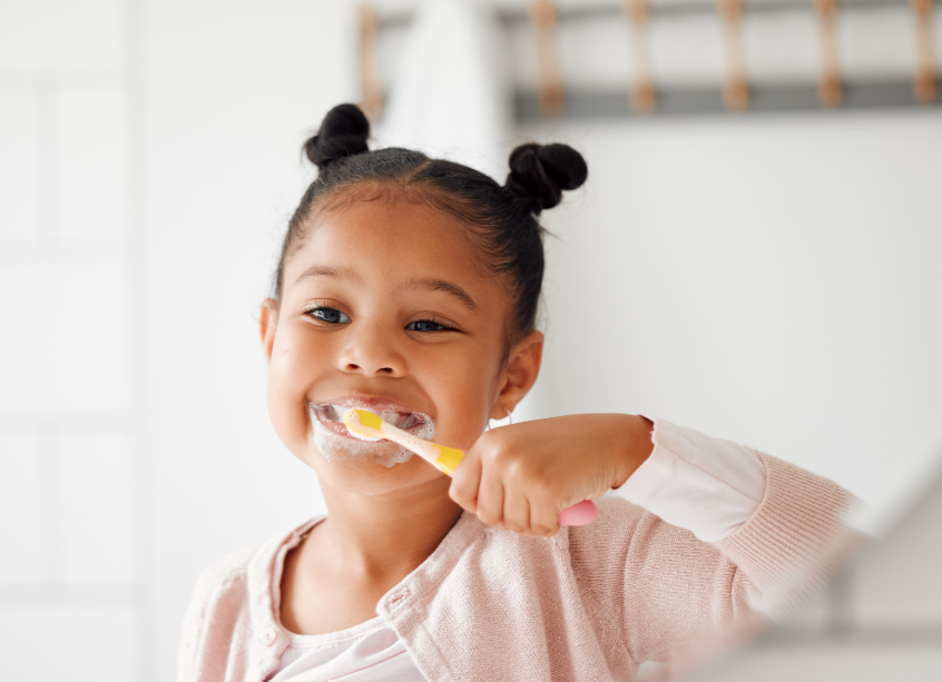 Child brushing teeth